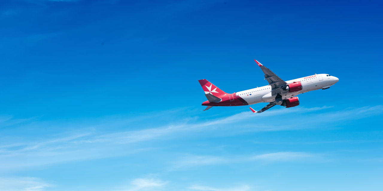 Will Airfare Prices Come Down? Travel Experts Say You Should Book Your 2026 Flights Now